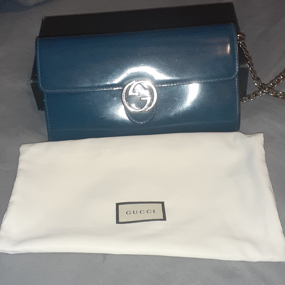 Gucci wallet on a chain.